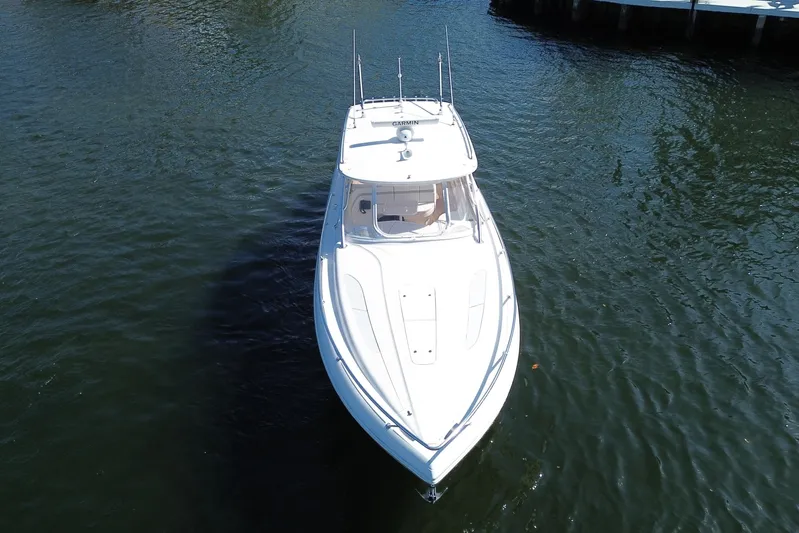 Day Dreams Yacht Photos Pics 2021 Intrepid 409 Valor boat on calm water, aerial view.