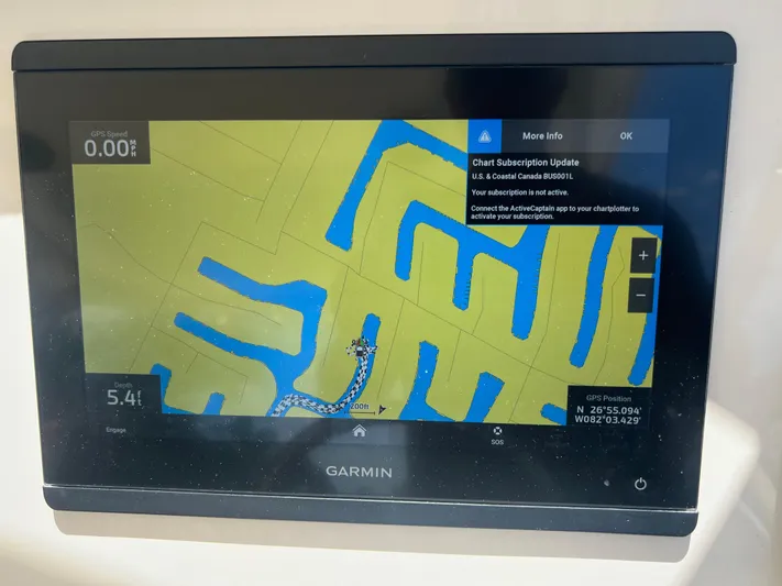 (no Name) Yacht Photos Pics Garmin GPS display on 2019 Grady-White 275 boat showing navigation map and chart update alert.