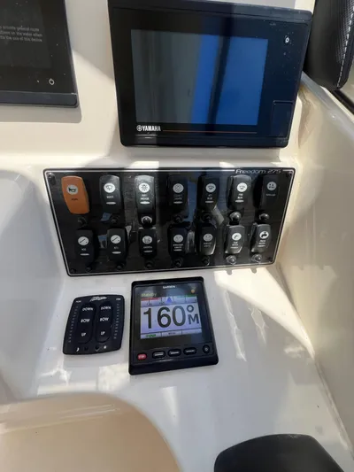 (no Name) Yacht Photos Pics Control panel of a 2019 Grady-White 275 boat with Yamaha display and Garmin device.