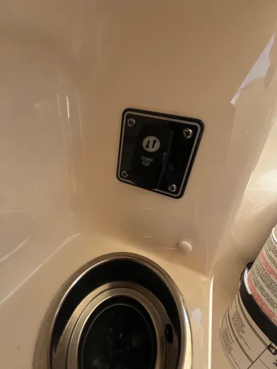 (no Name) Yacht Photos Pics Power seat switch on 2019 Grady-White 275 boat interior.
