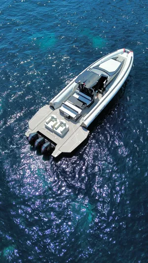  Yacht Photos Pics 2025 Anvera 42 Speedster boat cruising on clear blue water.