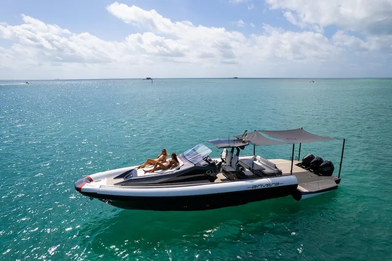  Yacht Photos Pics 2025 Anvera 42 Speedster yacht cruising on turquoise ocean under clear skies.