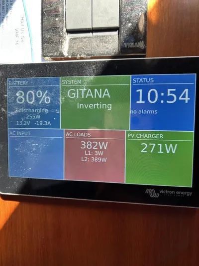 Gitana Yacht Photos Pics Display panel on 2006 Beneteau Oceanis 523 showing battery, system, and power status.