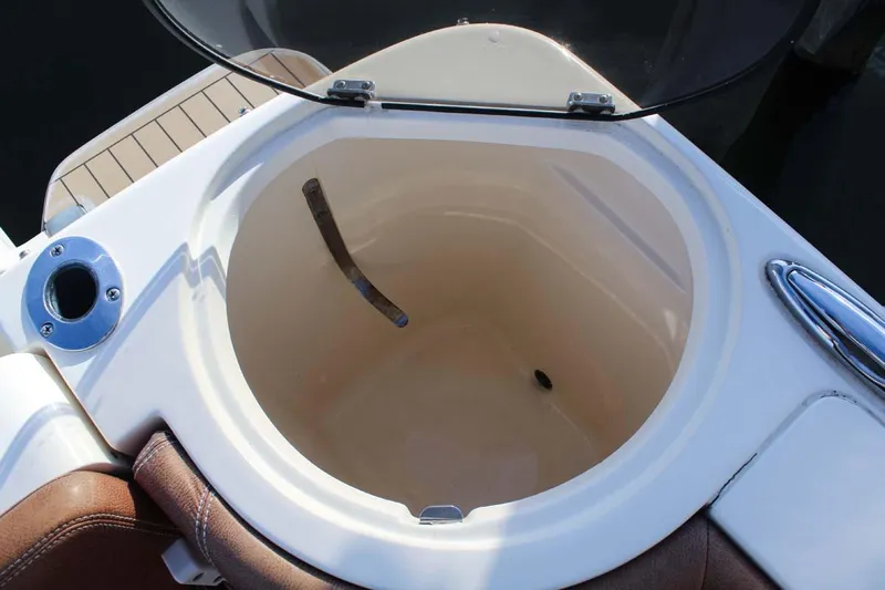 Scout 275 Dorado Yacht Photos Pics 2018 Scout 275 Dorado boat storage compartment with open lid.