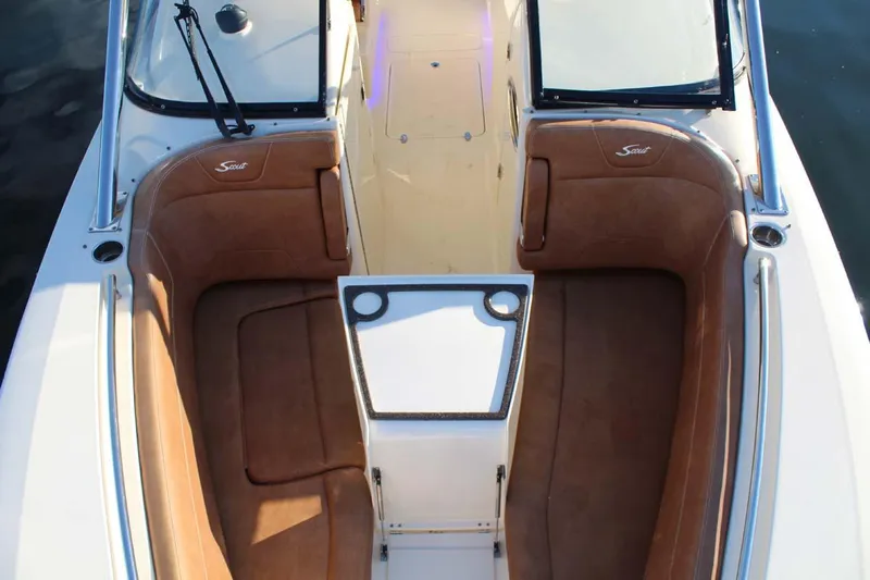 Scout 275 Dorado Yacht Photos Pics 2018 Scout 275 Dorado boat interior with tan seating and white accents.