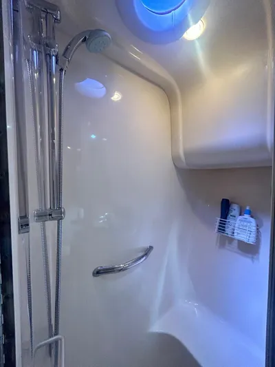  Yacht Photos Pics Shower area in 2007 Sea Ray 44 Sedan Bridge yacht with modern fixtures.