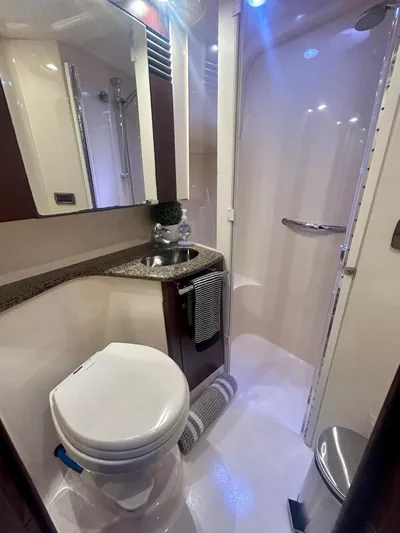 Yacht Photos Pics 2007 Sea Ray 44 Sedan Bridge bathroom with modern fixtures and compact design.