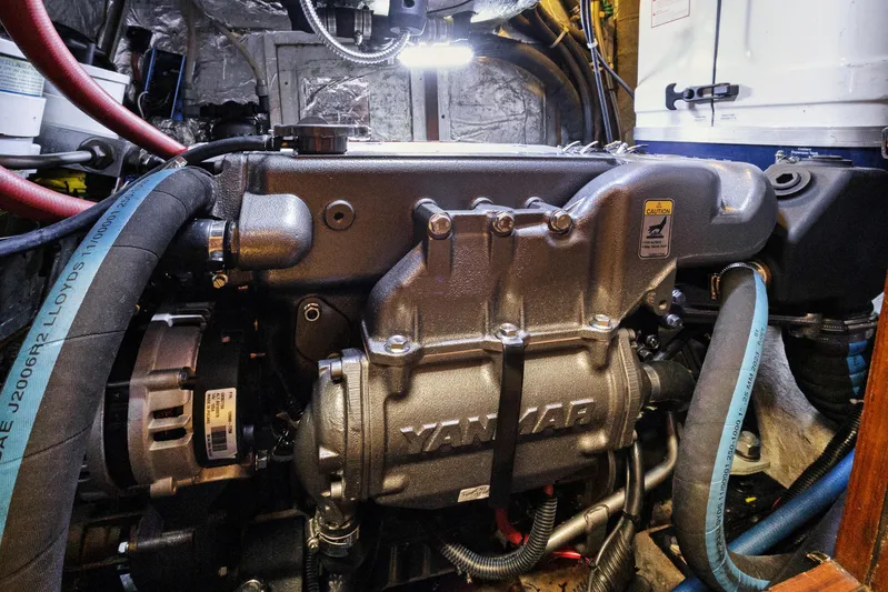 Southern Cross Yacht Photos Pics Engine compartment of a 2004 Hylas 46 yacht featuring a Yanmar engine.