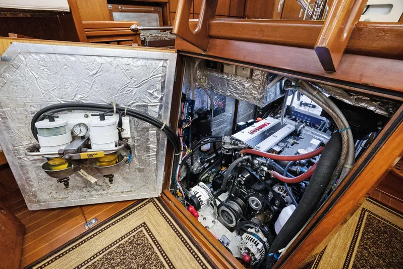 Southern Cross Yacht Photos Pics Engine room of a 2004 Hylas 46 yacht, showcasing detailed mechanical components.