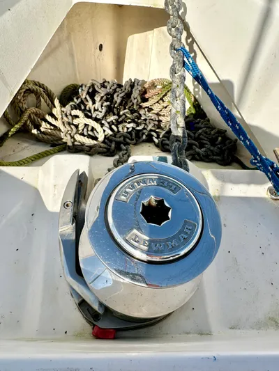 To The Gills Yacht Photos Pics Anchor windlass on 2014 Hunter 33 sailboat with coiled rope and chain.