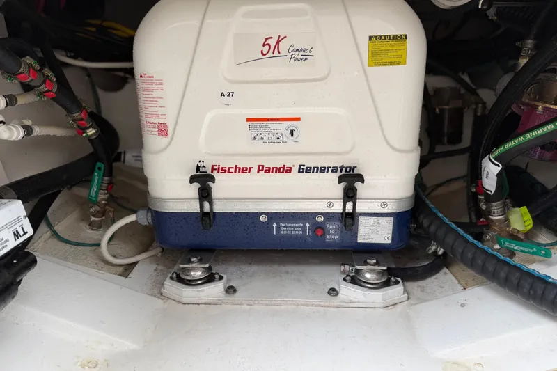  Yacht Photos Pics Fischer Panda generator in 2025 Pursuit OS 325 Offshore boat engine room.