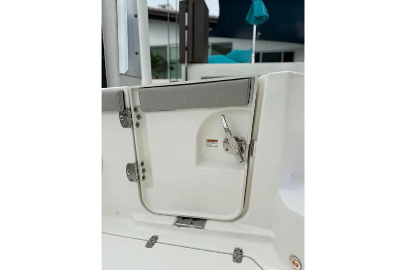  Yacht Photos Pics 2025 Pursuit OS 325 Offshore boat door with stainless steel latch and hinges.