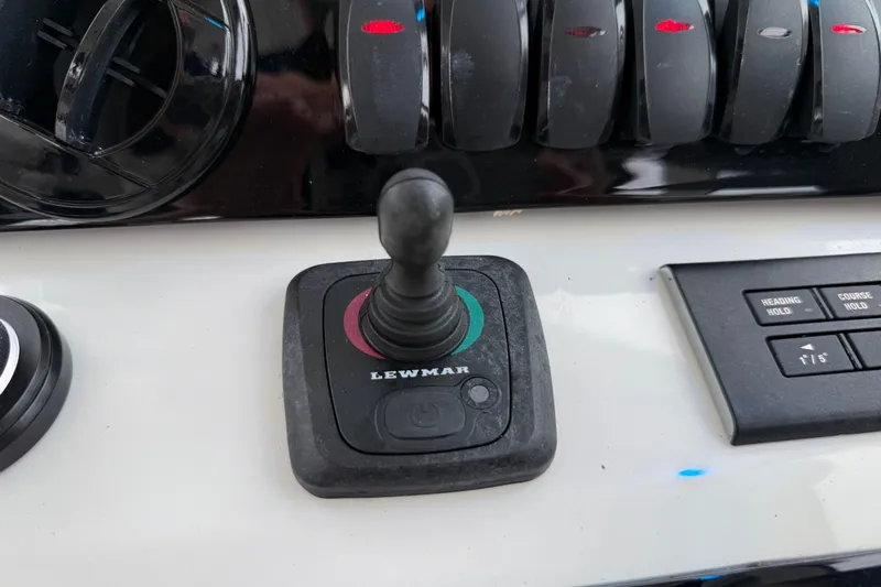  Yacht Photos Pics Control panel of 2025 Pursuit OS 325 Offshore boat with Lewmar joystick.