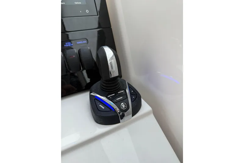  Yacht Photos Pics Joystick control on 2025 Pursuit OS 325 Offshore boat dashboard.