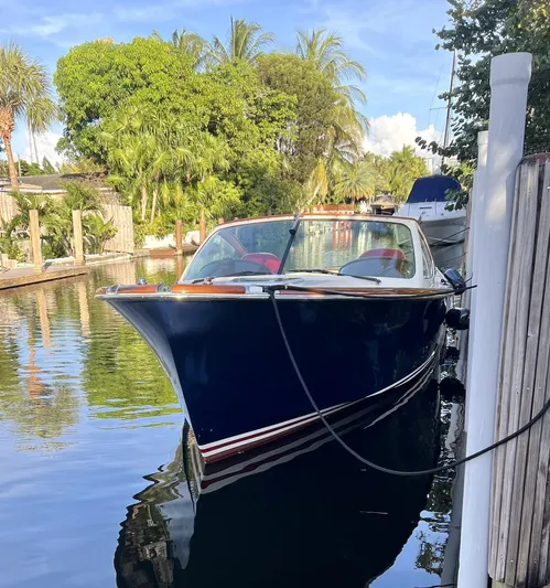 Le Ti Yacht Photos Pics 2004 Hinckley Talaria 29R docked in a tropical canal.