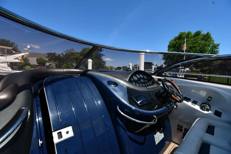 007 Yacht Photos Pics Cockpit of 2000 Sunseeker Superhawk 34 with blue dashboard.