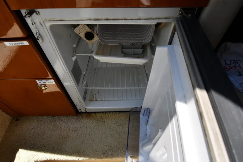 007 Yacht Photos Pics Open fridge in a 2000 Sunseeker Superhawk 34 yacht.