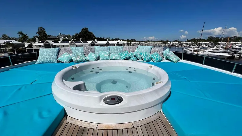 Missy B II Yacht Photos Pics Luxurious 2005 Hargrave Custom Yacht with jacuzzi and turquoise seating on deck.