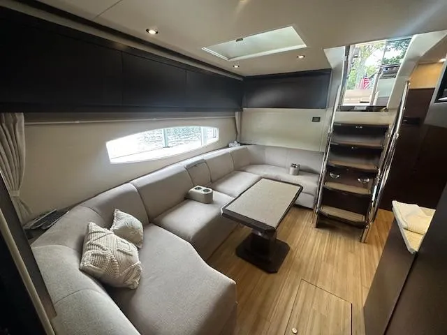  Yacht Photos Pics Luxurious interior of 2017 Regal 53 Sport Coupe yacht with elegant seating and modern design.