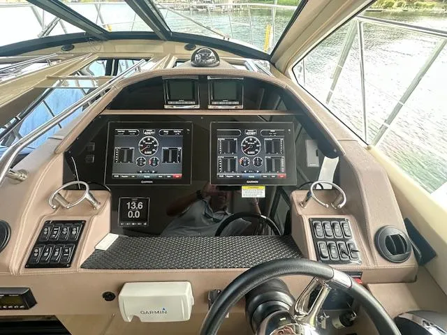  Yacht Photos Pics Control panel of a 2017 Regal 53 Sport Coupe yacht with navigation displays.