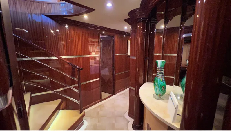 Missy B II Yacht Photos Pics Luxurious interior of 2005 Hargrave Custom Yacht with elegant wood finishes and decorative vase.