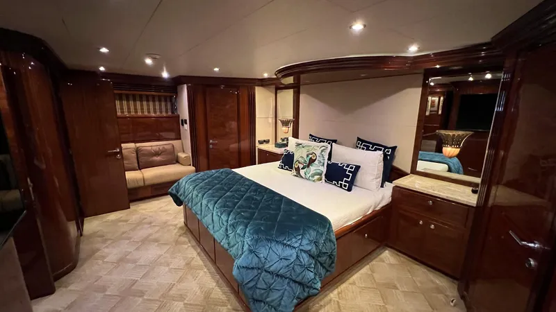 Missy B II Yacht Photos Pics Luxurious 2005 Hargrave Custom Yacht bedroom with elegant wood finishes and plush bedding.