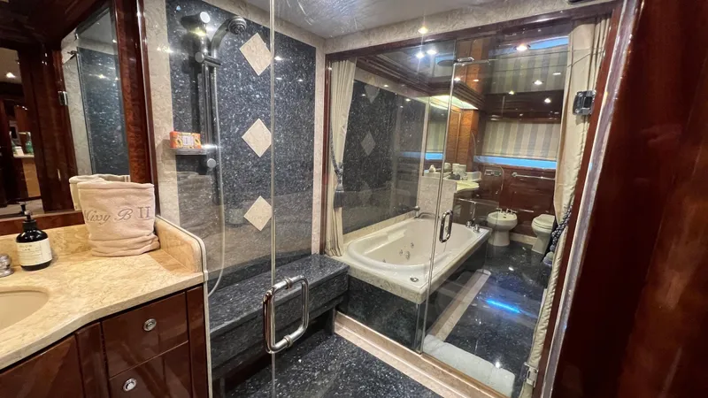 Missy B II Yacht Photos Pics Luxurious bathroom in 2005 Hargrave Custom Yacht with elegant marble and glass shower.
