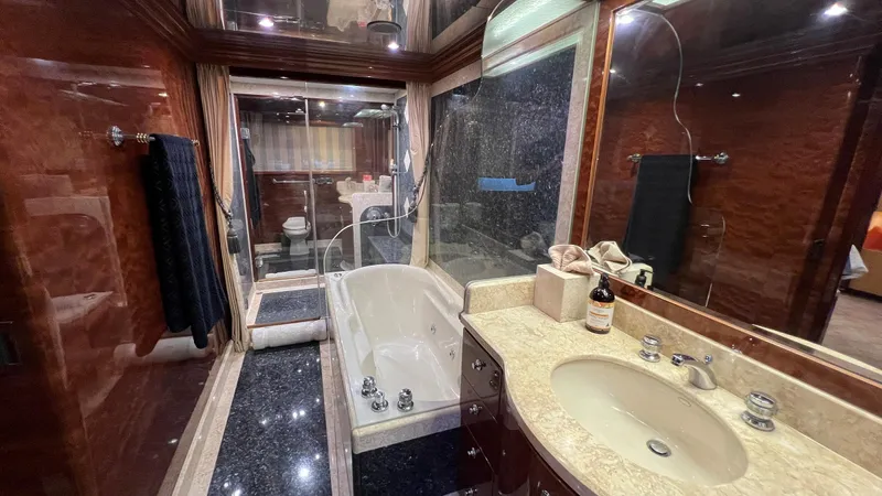 Missy B II Yacht Photos Pics Luxurious bathroom in a 2005 Hargrave Custom Yacht with elegant fixtures and marble accents.