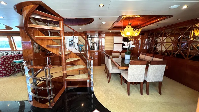 Missy B II Yacht Photos Pics Luxurious 2005 Hargrave Custom Yacht interior with elegant staircase and dining area.