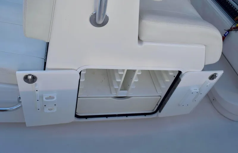 Caryali Yacht Photos Pics 2014 Invincible Open Fisherman boat storage compartment with open doors.