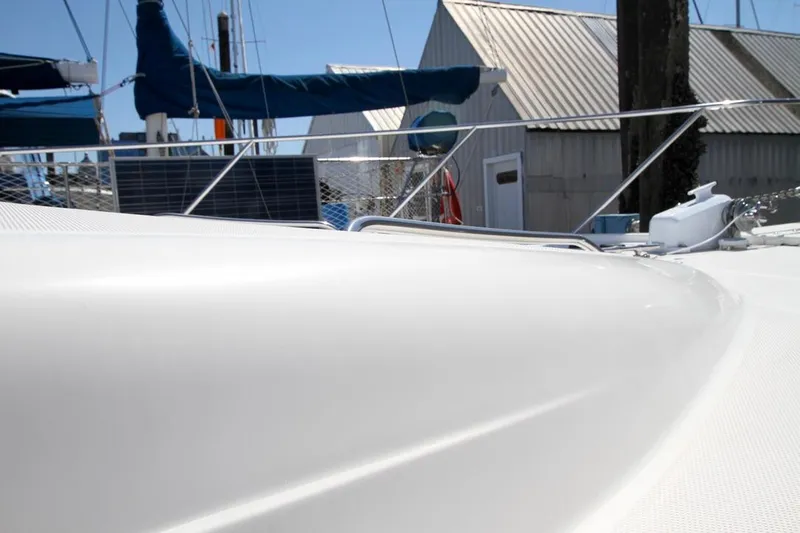  Yacht Photos Pics 2002 Bayliner 3988 yacht deck with marina background.