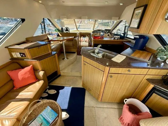  Yacht Photos Pics Luxurious interior of a 2002 Bayliner 3988 yacht with modern amenities and elegant design.