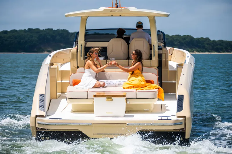  Yacht Photos Pics Two women enjoying a toast on a 2026 Bellini Astor 36 yacht.