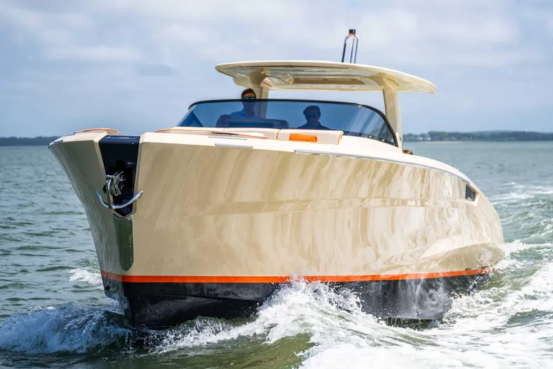  Yacht Photos Pics 2026 Bellini Astor 36 yacht cruising on open water, showcasing sleek design and luxury.