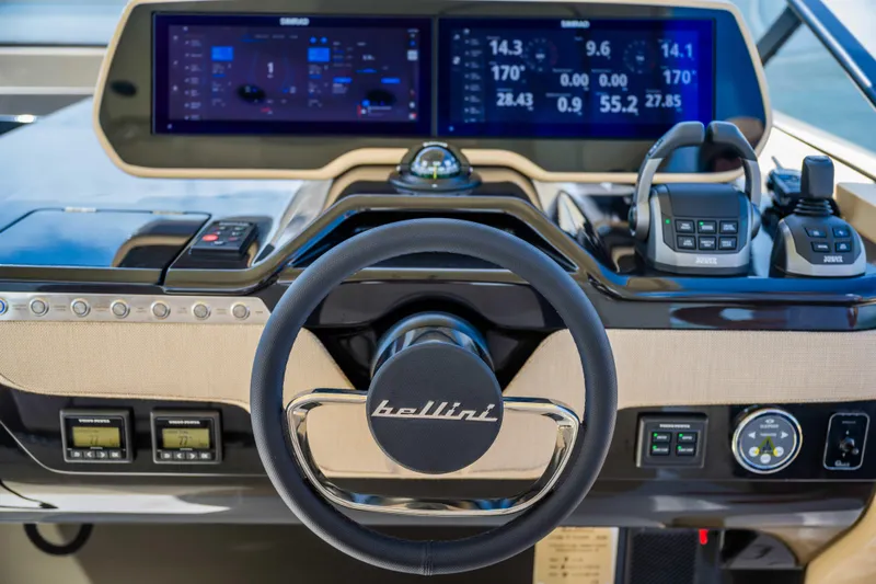  Yacht Photos Pics Steering wheel and dashboard of 2026 Bellini Astor 36 yacht, featuring advanced navigation controls.