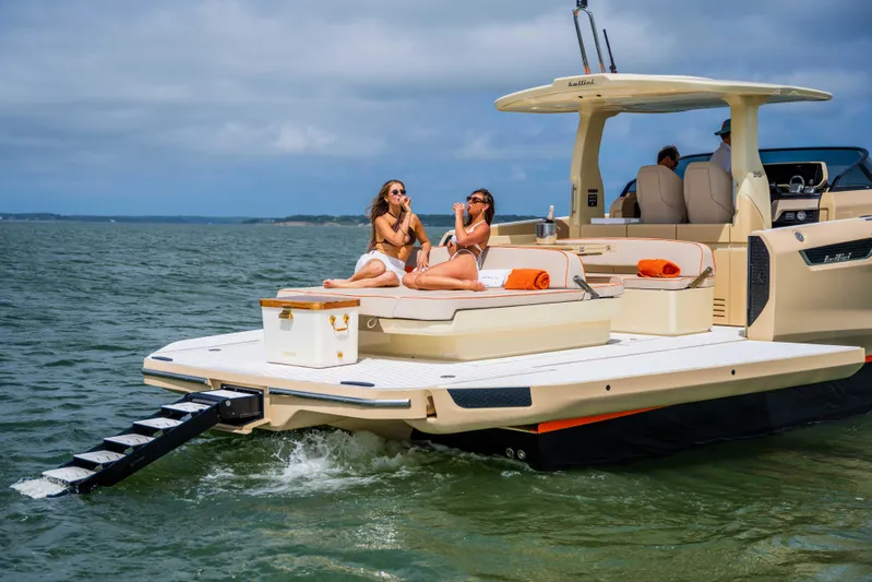  Yacht Photos Pics Luxury Bellini Astor 36 yacht, 2026 model, with sunbathers enjoying the deck.