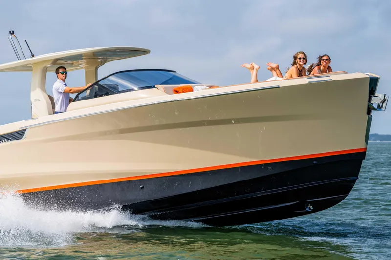  Yacht Photos Pics 2026 Bellini Astor 36 boat cruising with passengers enjoying the ride.