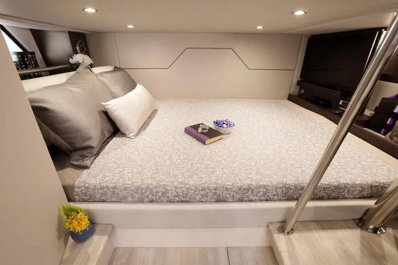 Endless Summer Yacht Photos Pics Manufacturer Provided Image: 2023 Formula 430 Super Sport Crossover cabin with cozy bed and modern decor.