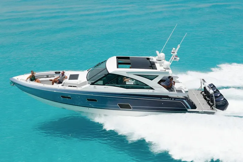 Endless Summer Yacht Photos Pics Manufacturer Provided Image: 2023 Formula 430 Super Sport Crossover cruising on turquoise water.