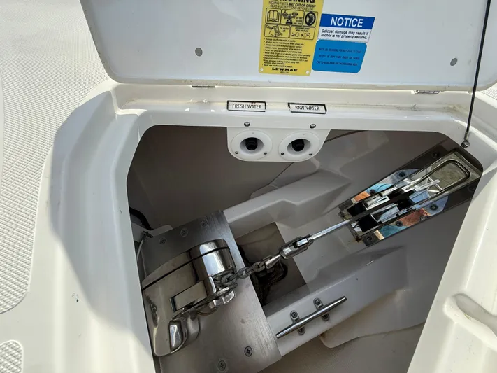  Yacht Photos Pics Anchor compartment of 2017 Pursuit DC 325 Dual Console boat, showing chain and winch system.