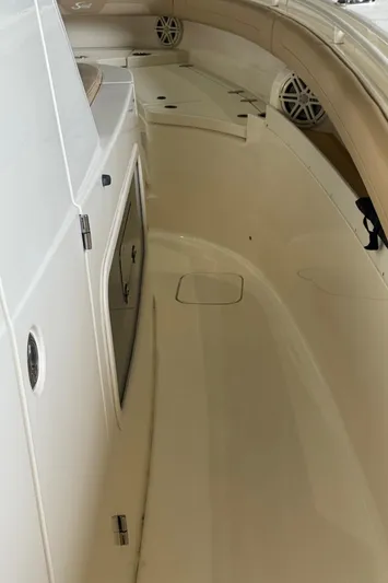  Yacht Photos Pics 2019 Scout 350 LXF boat interior, featuring sleek design and spacious seating area.