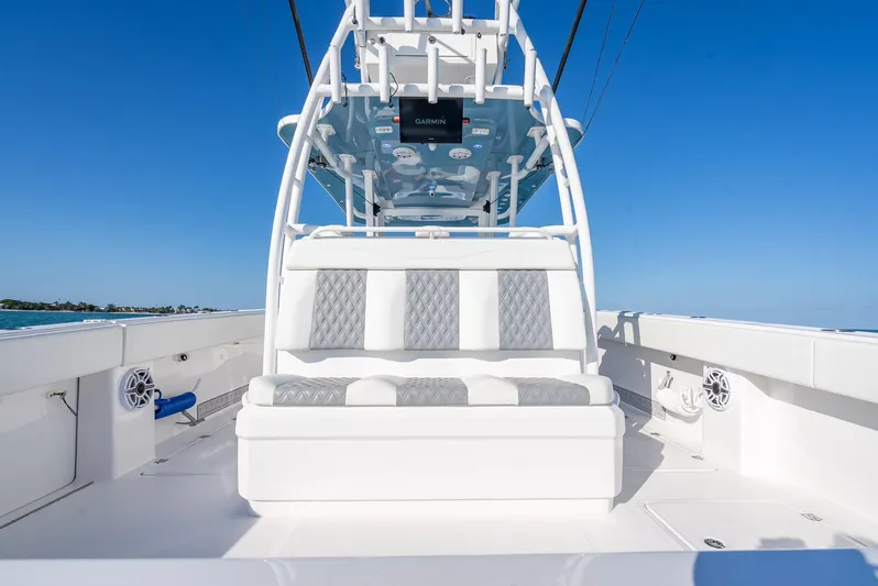  Yacht Photos Pics 2023 Invincible 37 Catamaran with sleek seating and modern design on open water.