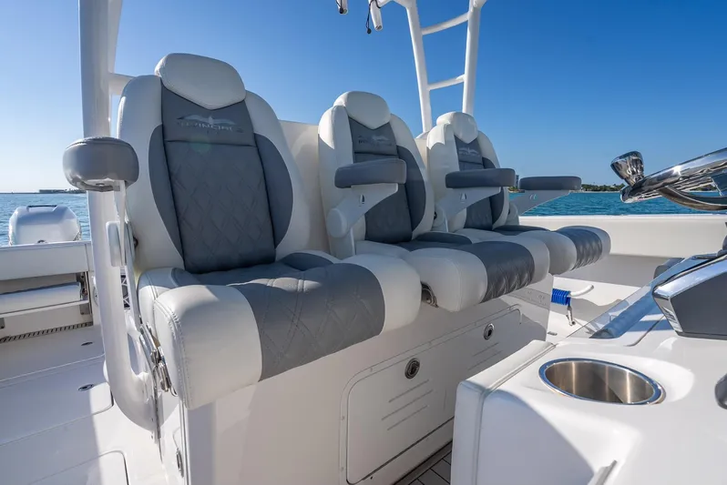  Yacht Photos Pics Luxury seating on 2023 Invincible 37 Catamaran, featuring plush, ergonomic design and ocean backdrop.