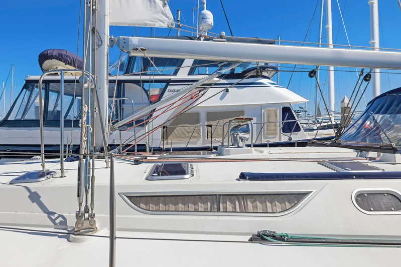 Crazy Horse Yacht Photos Pics Jeanneau Sun Odyssey 52.2 sailboat docked in a marina, 2001 model.