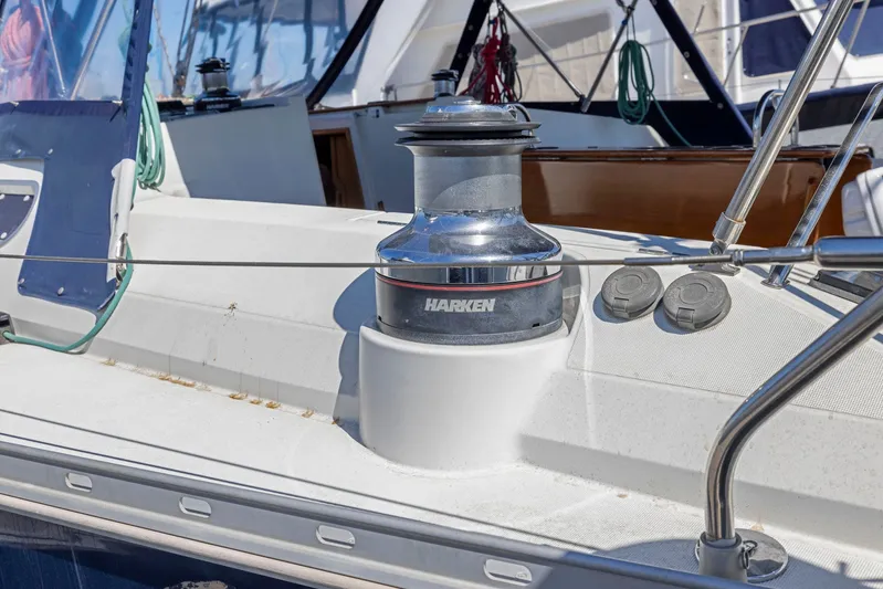Crazy Horse Yacht Photos Pics Jeanneau Sun Odyssey 52.2 sailboat deck with Harken winch, 2001 model.