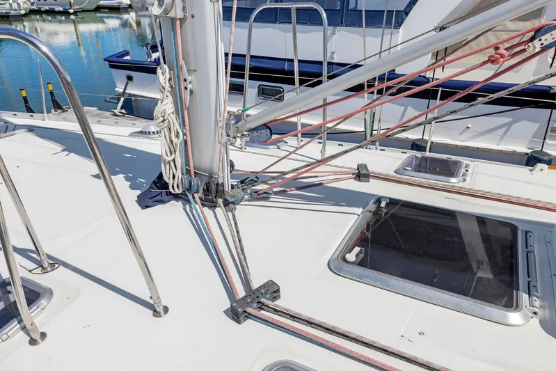 Crazy Horse Yacht Photos Pics Deck view of 2001 Jeanneau Sun Odyssey 52.2 sailboat with rigging and hatches.