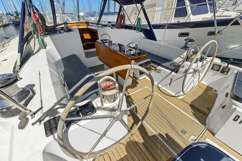 Crazy Horse Yacht Photos Pics Cockpit of 2001 Jeanneau Sun Odyssey 52.2 sailboat with dual steering wheels.