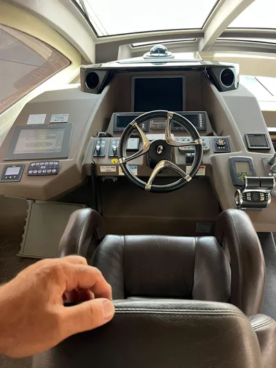  Yacht Photos Pics Cockpit of 2012 Cranchi Sixty 6 Fly Yacht with modern navigation controls.