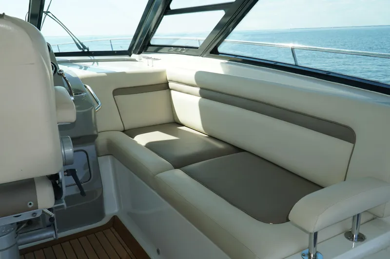  Yacht Photos Pics Luxurious interior seating on 2014 Sea Ray 540 Sundancer yacht with ocean view.