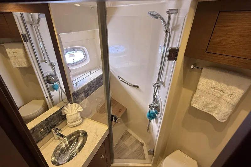  Yacht Photos Pics Luxurious bathroom in 2014 Sea Ray 540 Sundancer yacht with shower and sink.